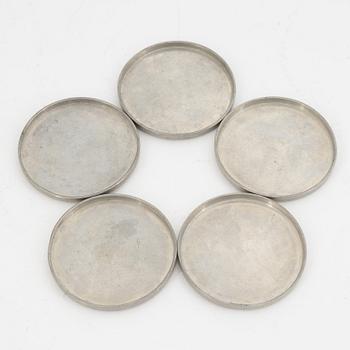 A group of 10 pewter coasters and 3 dishes, Firma Svenskt Tenn, 1948 and 1946.