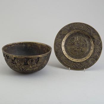 A Chinese brass bowl and Japanese dish, 20th century.