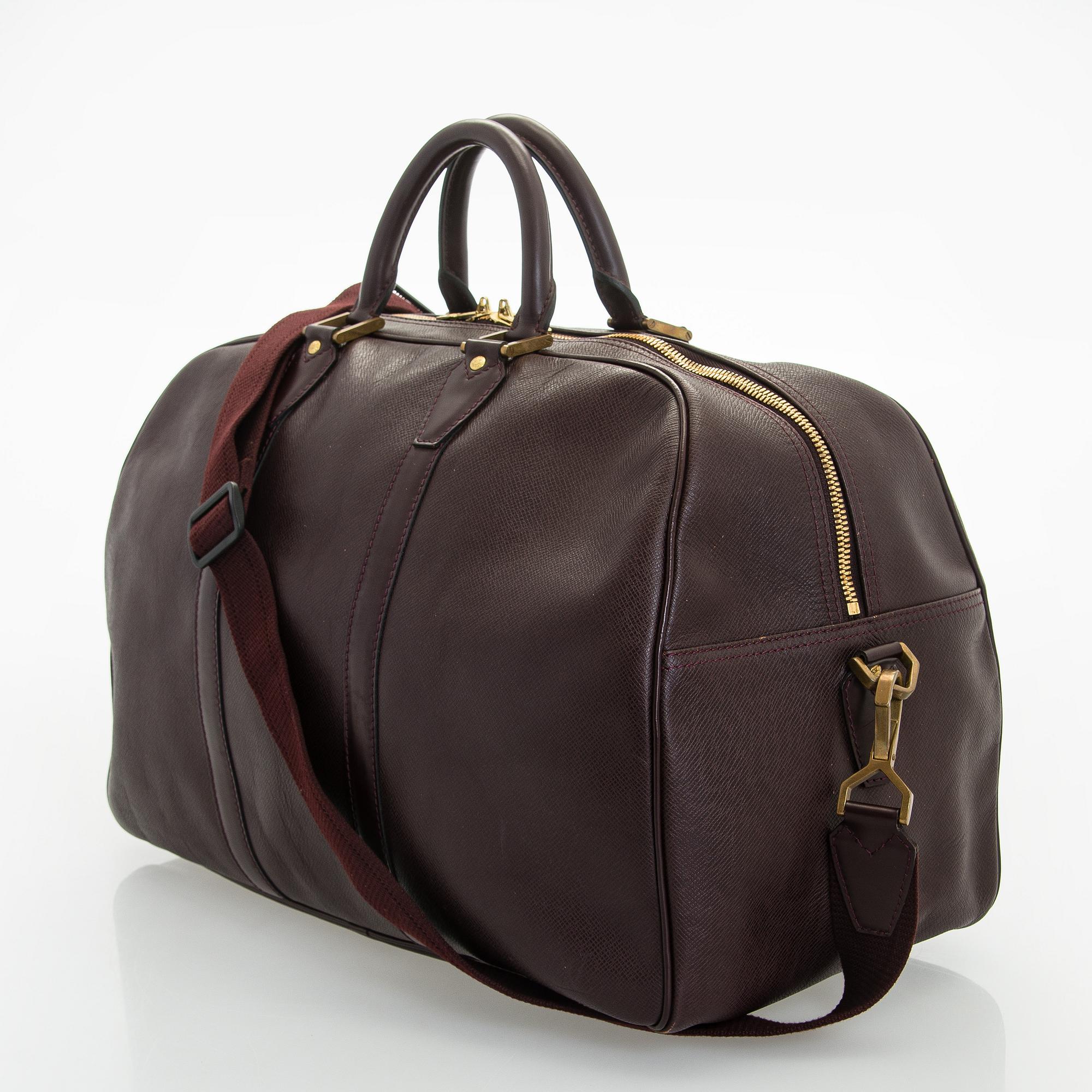 Louis Vuitton, a 'Taiga Kendall PM' weekend bag.