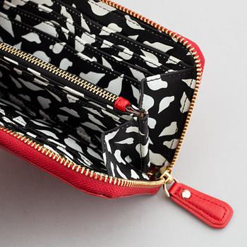Diane von Fürstenberg a red leather handbag and wallet.
