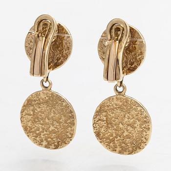 Cassandra Goad, a pair of 9K gold 'Tortilla Double' earrings. London.