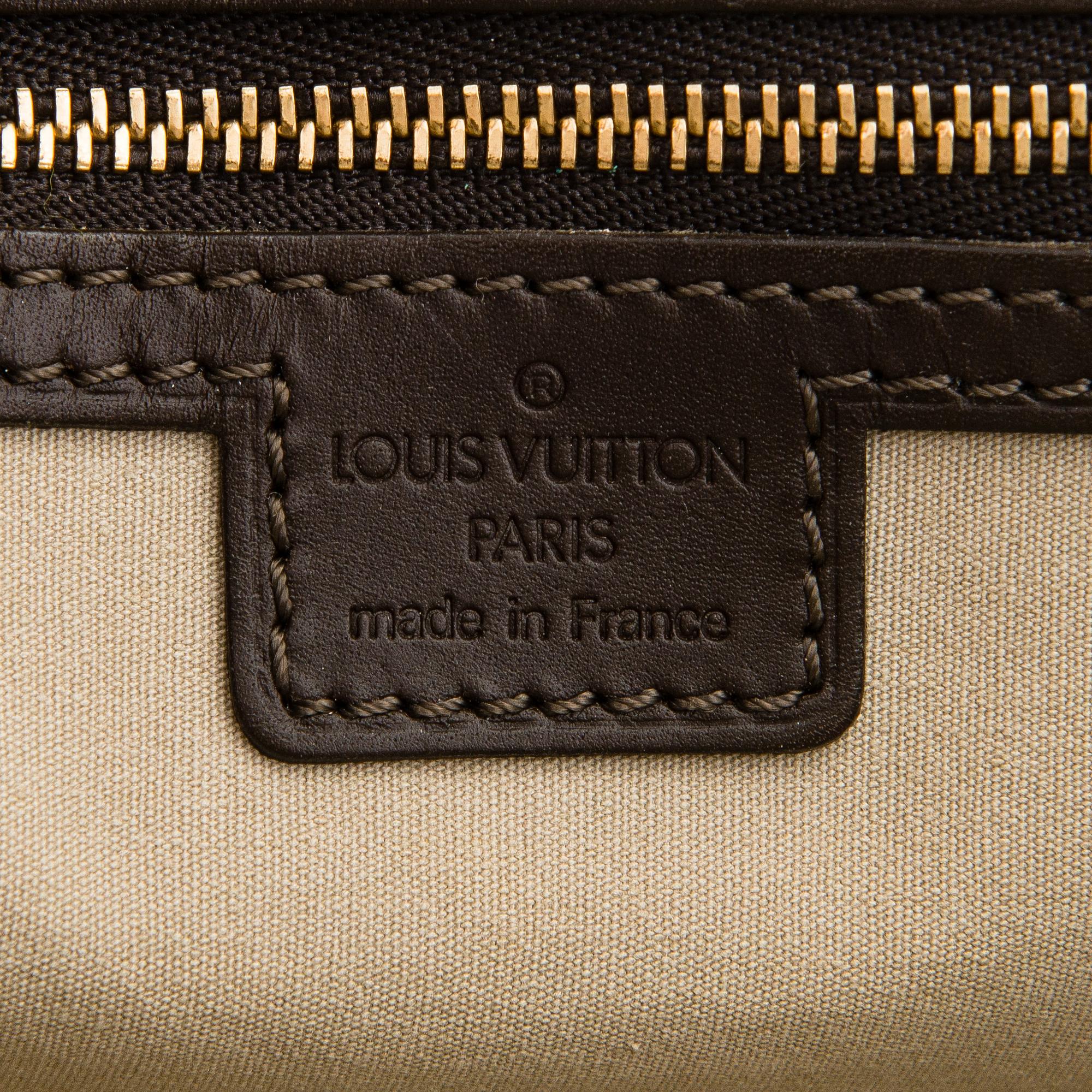Louis Vuitton, a 'Monogram Mini Lin Alma Long Handbag'.