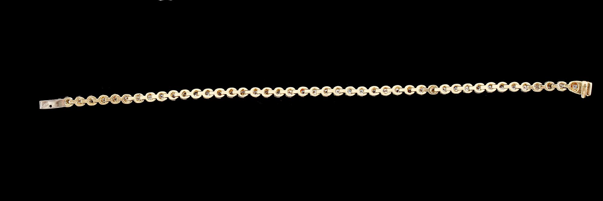 ARMBAND, 18 k guld, briljantslipade diamanter tot ca 3,15 ct.
