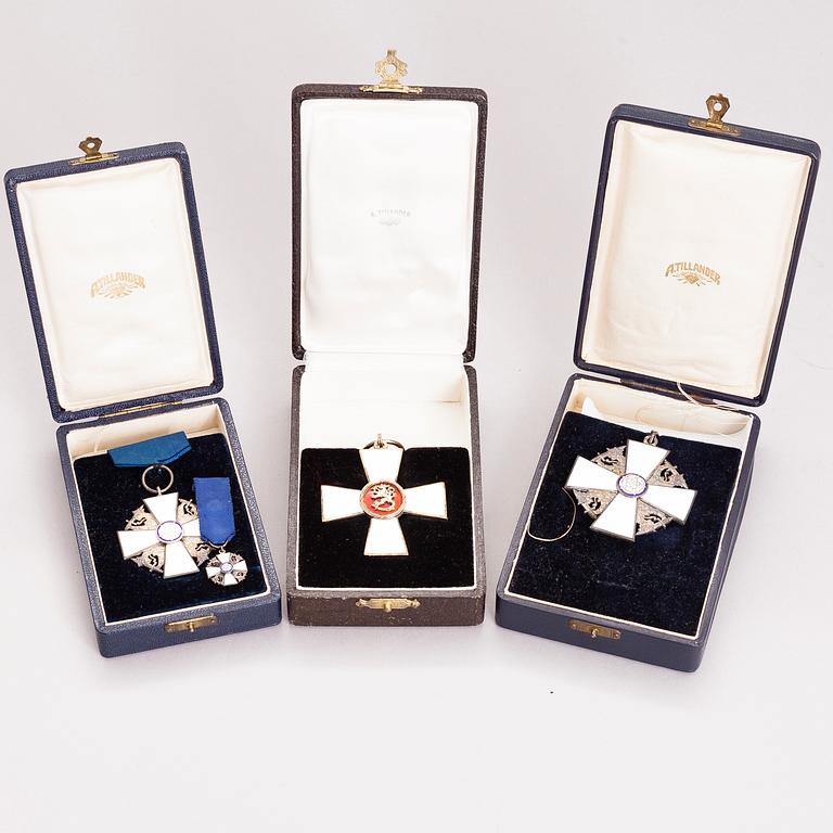 Three silver medals with enamel by A. Tillander.