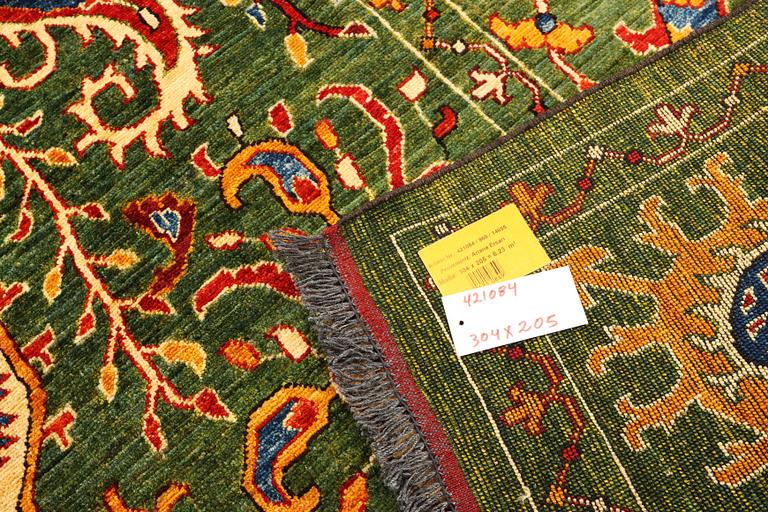 A Kazak carpet, c. 304 x 205 cm.