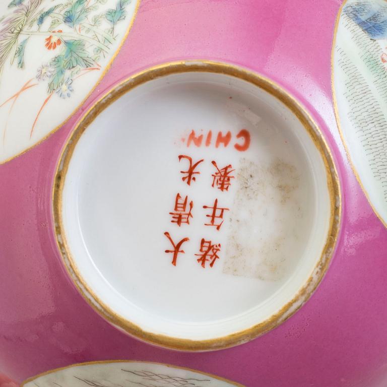 A pink-ground 20th century porcelain bowl, with Guangxus mark to the base.