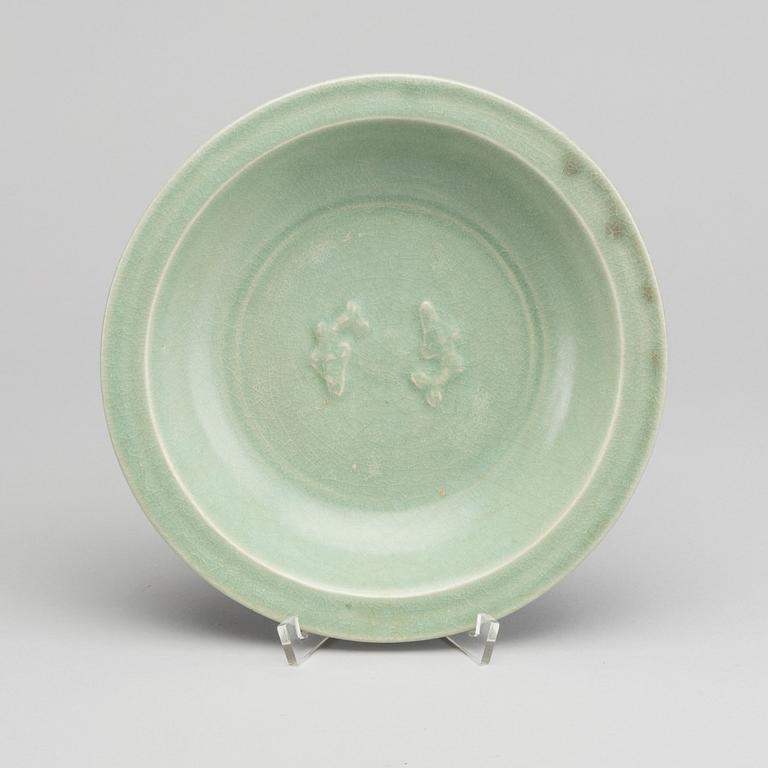 A Longquan celadon twin fish dish, Southern Song dynasty (1127-1279).