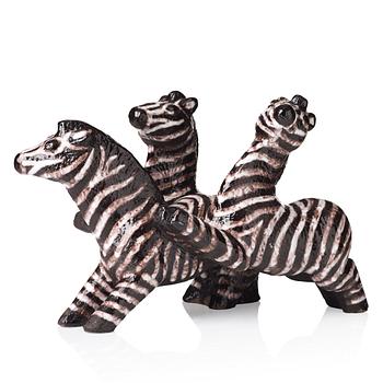 99. Vicke Lindstrand, a stoneware sculpture of three zebras, Upsala-Ekeby, Sweden.