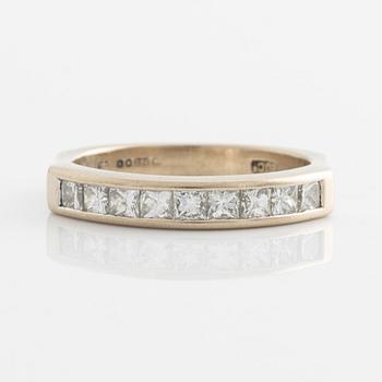 Ring, gold with nine princess-cut diamonds.