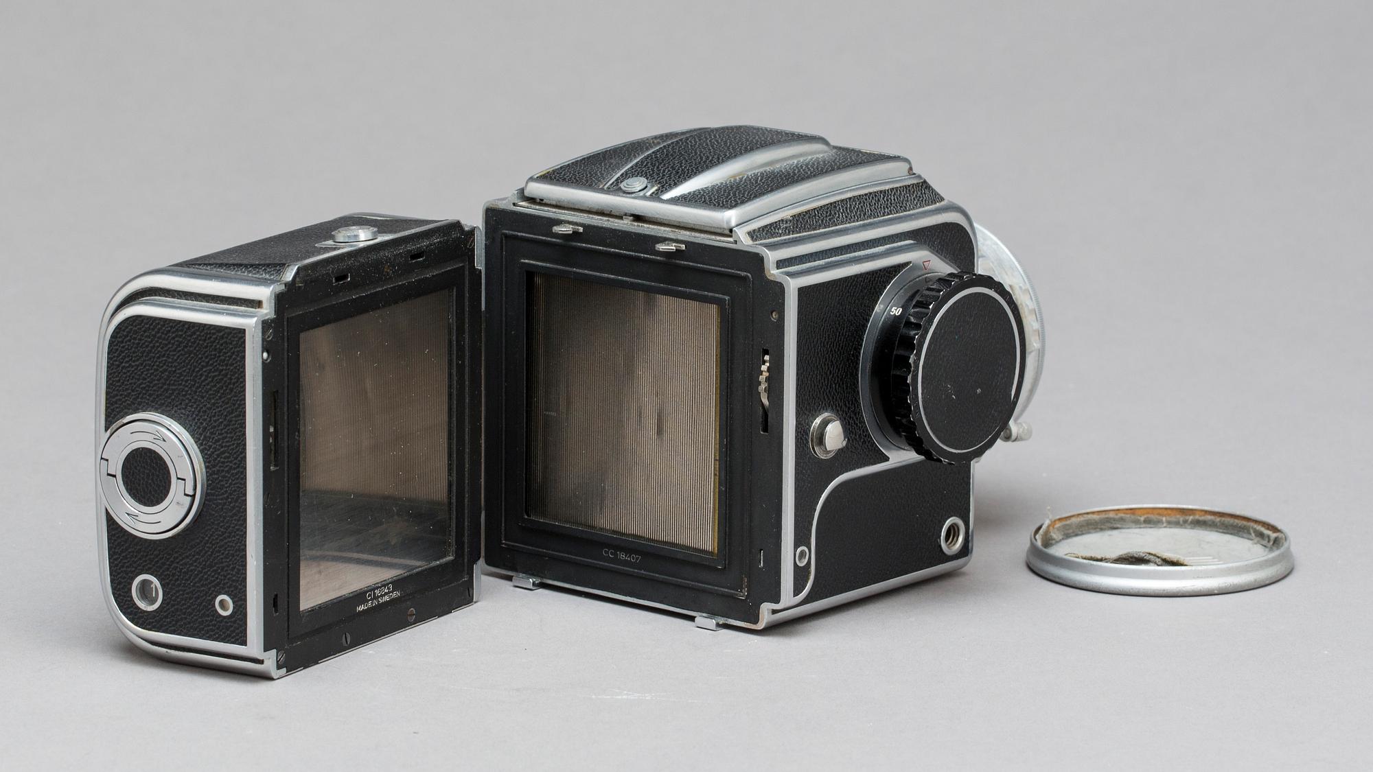 KAMERA Hasselblad 1000F samt objektiv Tessar 1:28 80 mm Zeiss-Opton nr 726939.