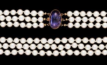 636. A three strand cultured pearl necklace.