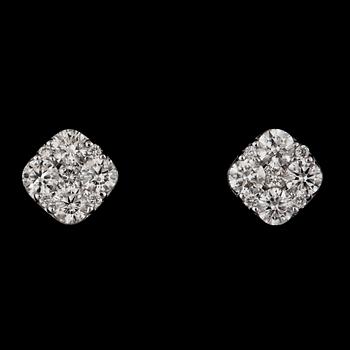 1162. A pair of brilliant cut diamond earrings, tot. 0.73 cts.