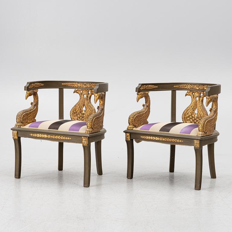 A pair of Empire-style armchairs with an end table, second half of the 20th century.