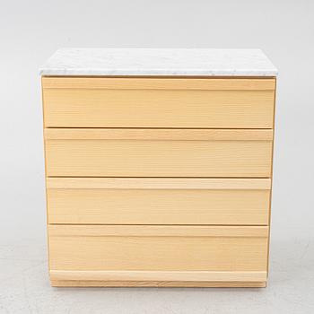 A contemporary chest of drawers.