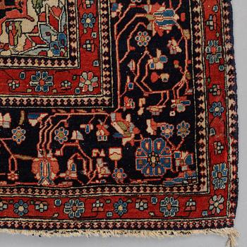 A RUG, a semi-antique Kashan Motachem, ca 217,5 x 134 cm.