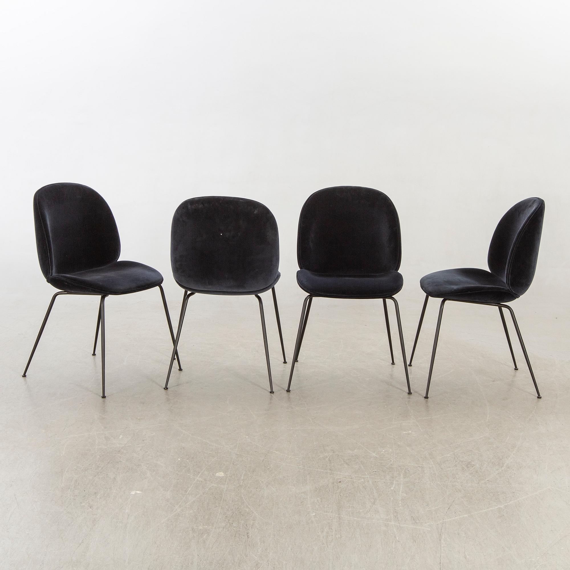 A set of four Beetle dining chairs by Gamfratesi for Gubi 2013.