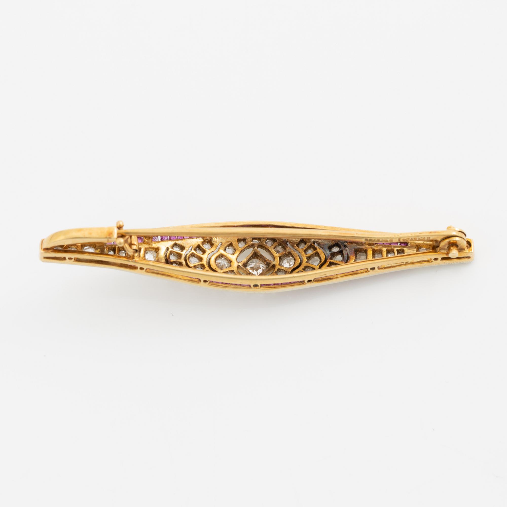 Brooch, 18K gold set with rose-cut and old mine-cut diamonds and probably synthetic rubies, circa 1900.