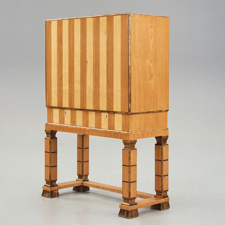 GUSTAV BERGSTRÖM, attributed to, a Swedish Grace cabinet on stand, 1930's.