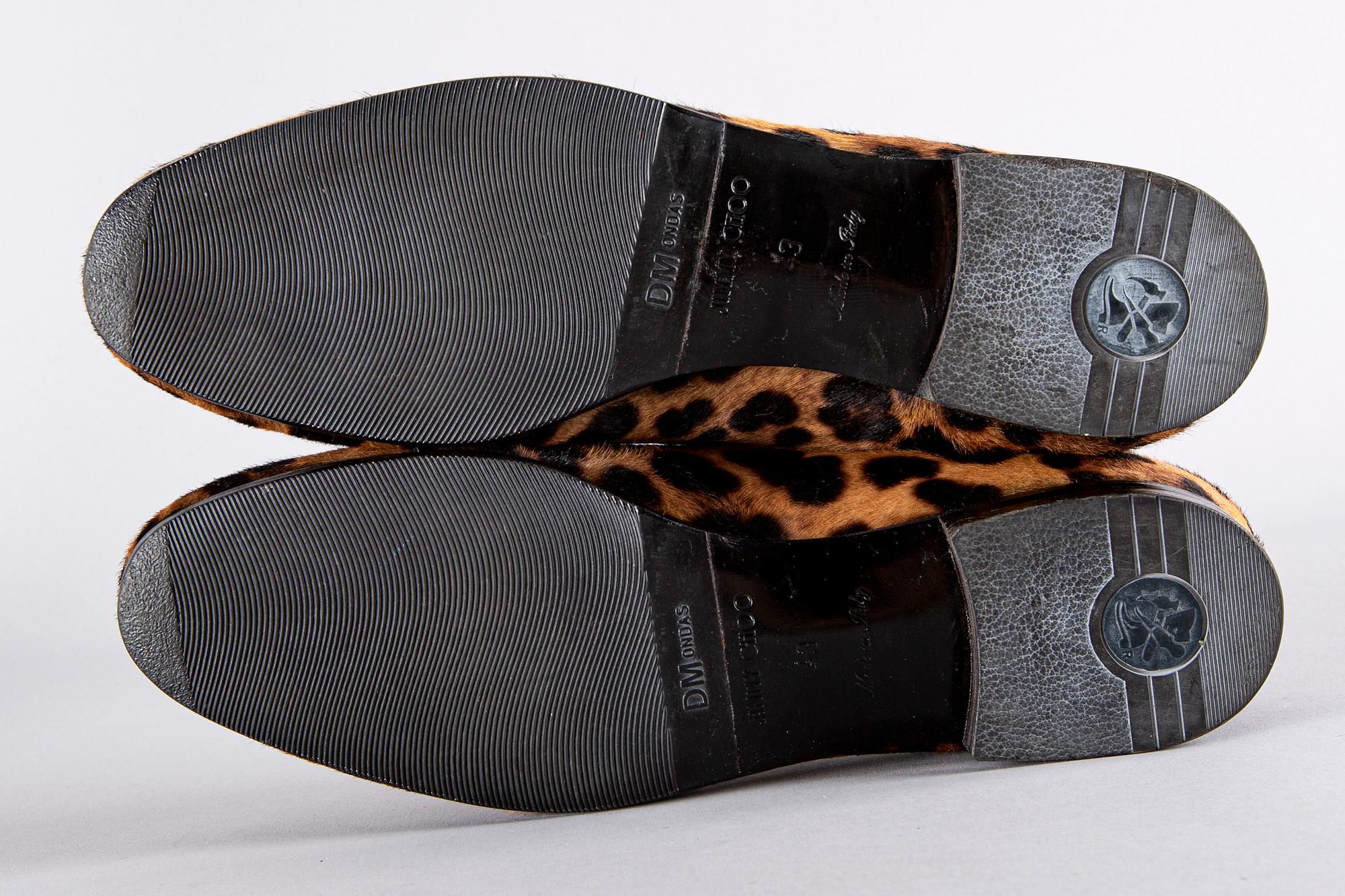 A pair of Jimmy Choo shoes, size 43.