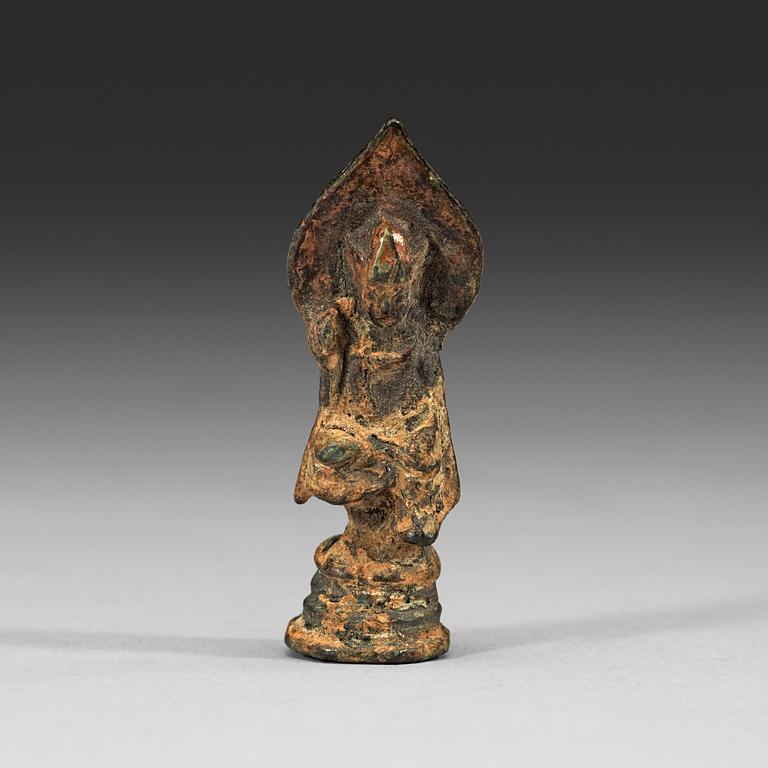 A miniature bronze figure of a enthroned seated Bodhisattva, presumably Tang dynasty (618-907).