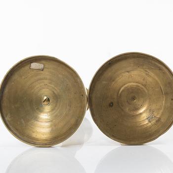 A pair of Empire candlesticks, France, early 19th Century.