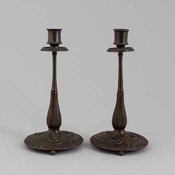 A PAIR OF BRONZE ART NOUVEAU CANDLESTICKS, early 20th century.