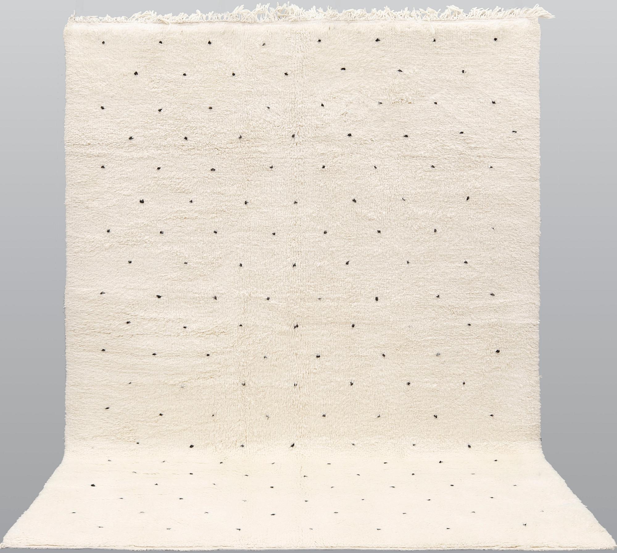 A Moroccan carpet, approx. 292 x 209 cm.