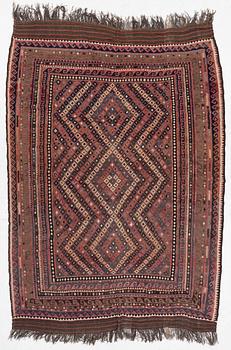 A semi-antique kilim carpet, a. 385 x 251 cm.