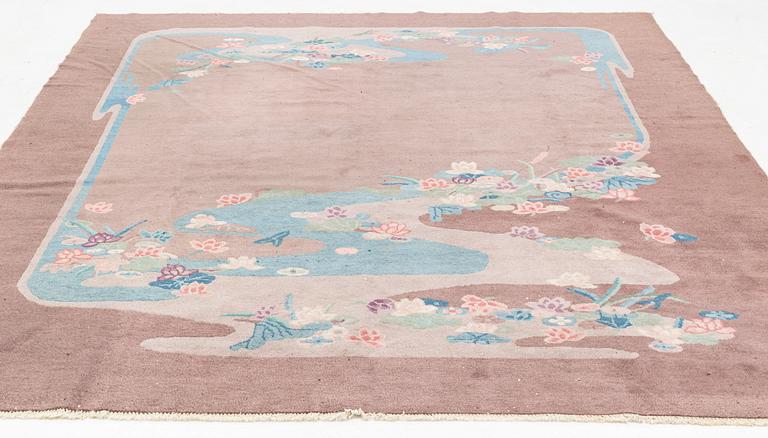 An antique/semi-antique Chinese carpet, c. 292 x 248 cm.