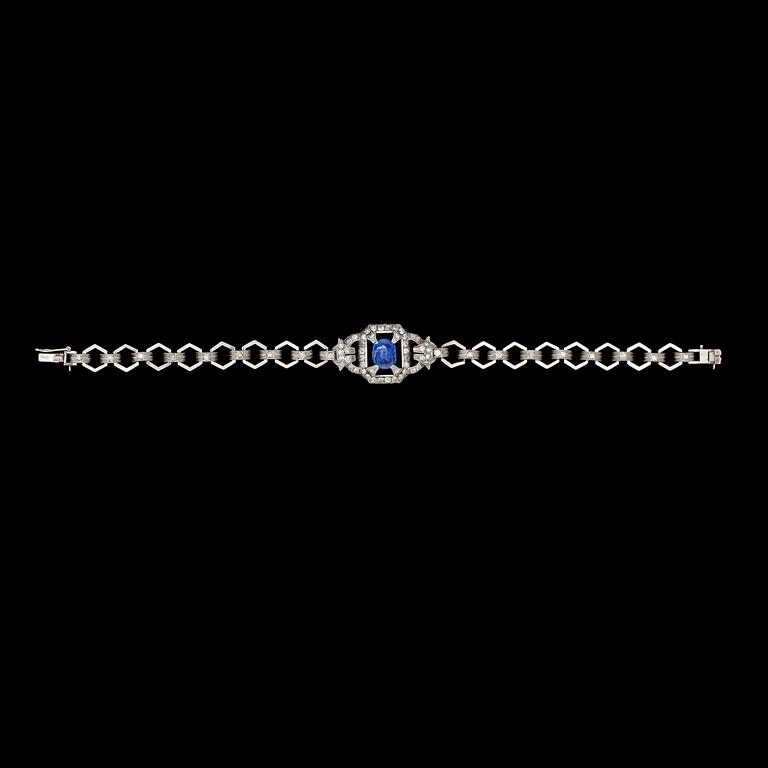 A cabochon cut blue sapphire and diamond bracelet, total carat weight  circa 1.20 cts.