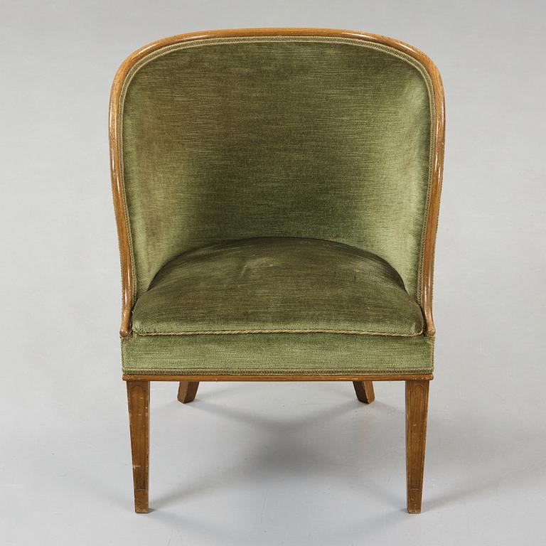Axel Einar Hjorth, A 'Bellman' elm armchair, attributed to Axel Einar Hjorth, Nordiska Kompaniet, Sweden ca 1929.