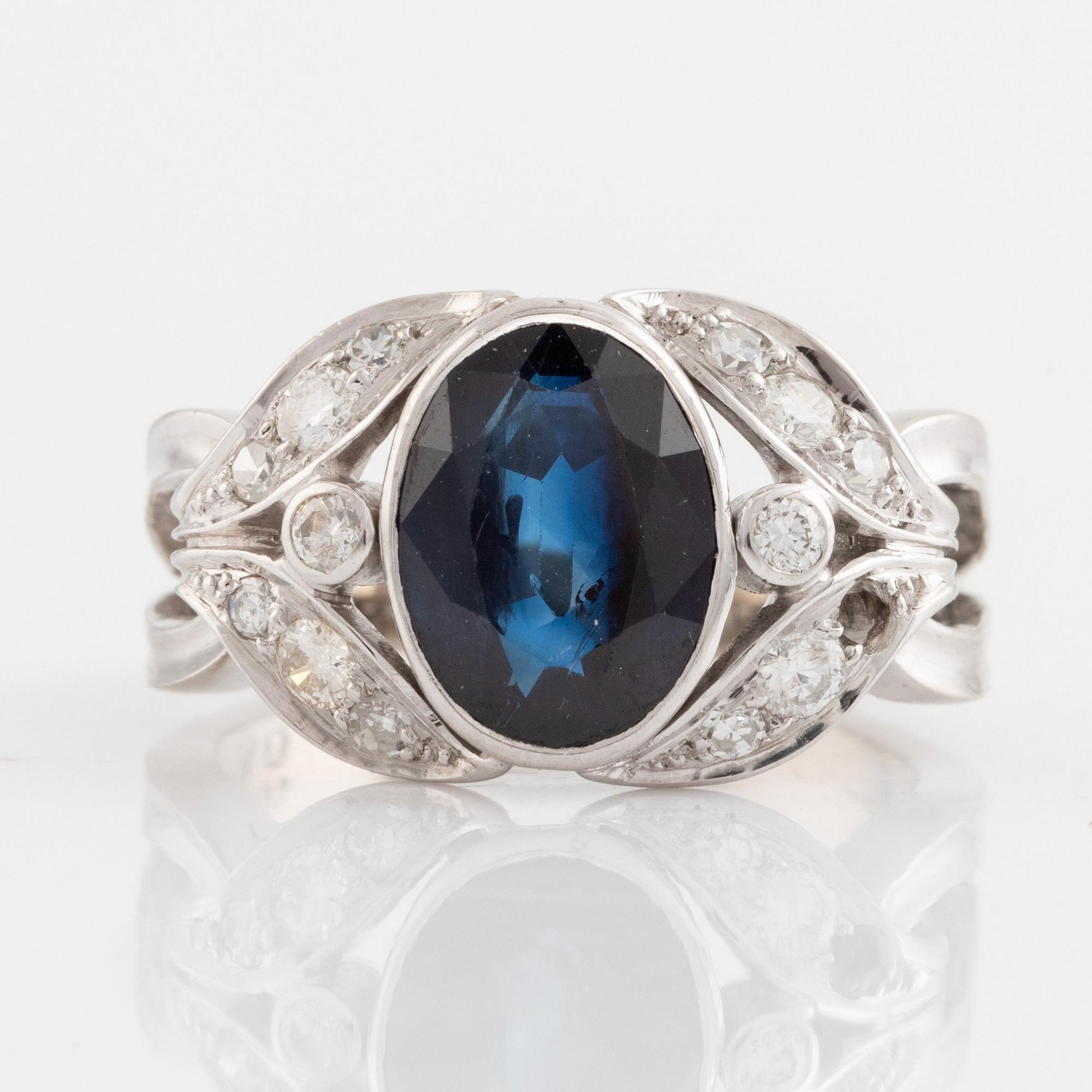 Sapphire and round brilliant cut diamond bracelet, ring and earrings.