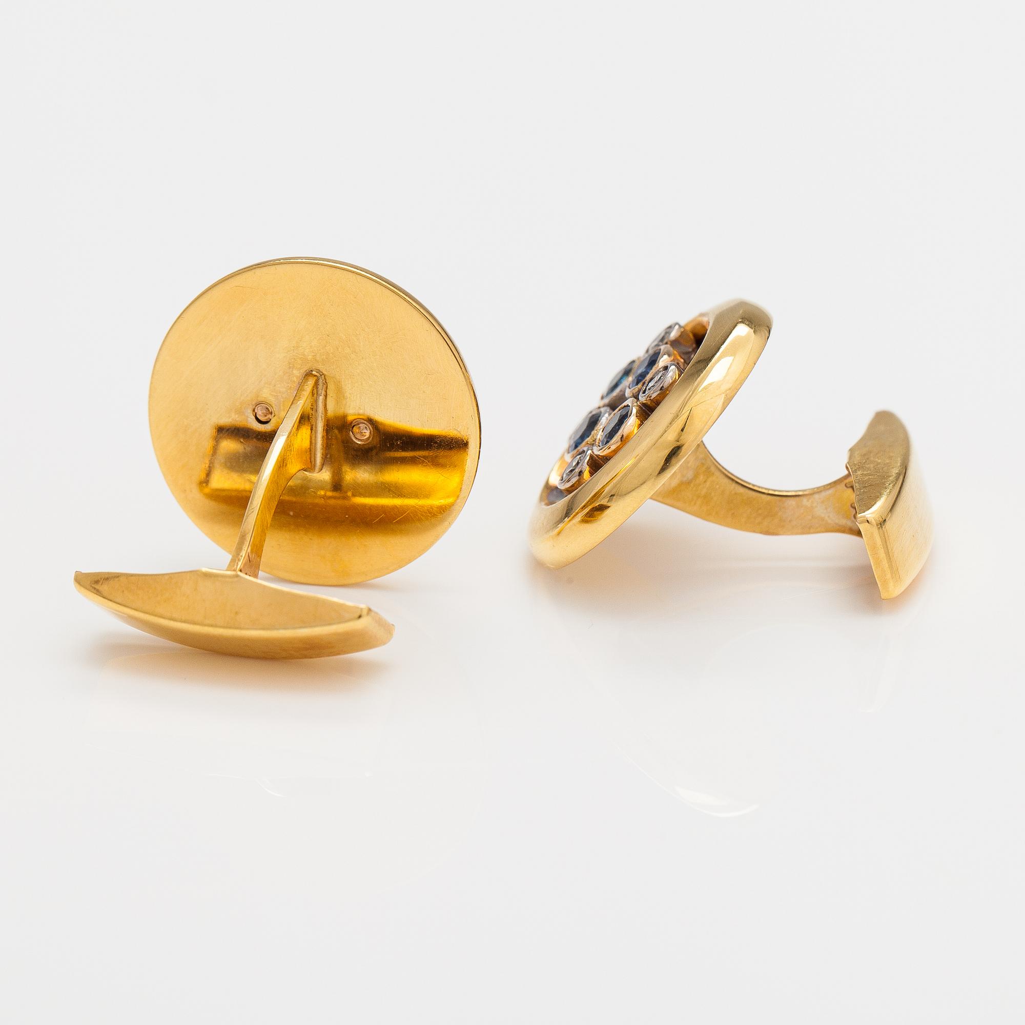 Manschettknappar, 18K guld, safirer och diamanter ca 0.40 ct tot. Rahapaja Insignia, Vanda 2007.