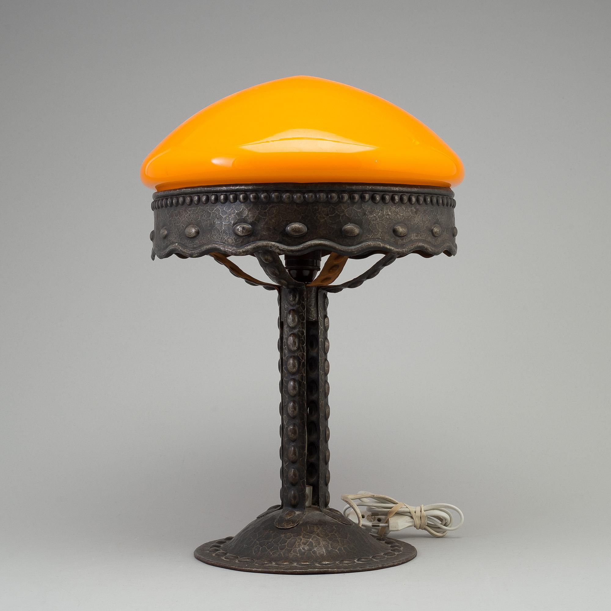 A early 20th century metal table light.
