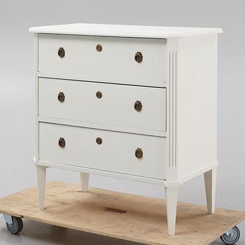 A painted Gustavian style chest of drawers, early 20 th Century.
