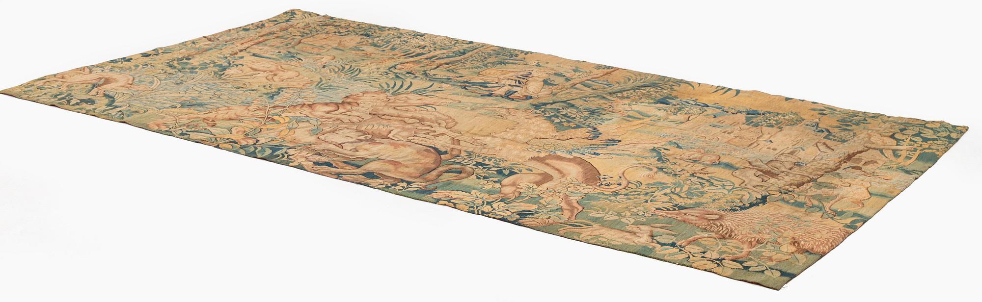 A Flemish 'Game park' tapestry, probably Audenarde, c. 331 x 177 cm, mid 16th century.