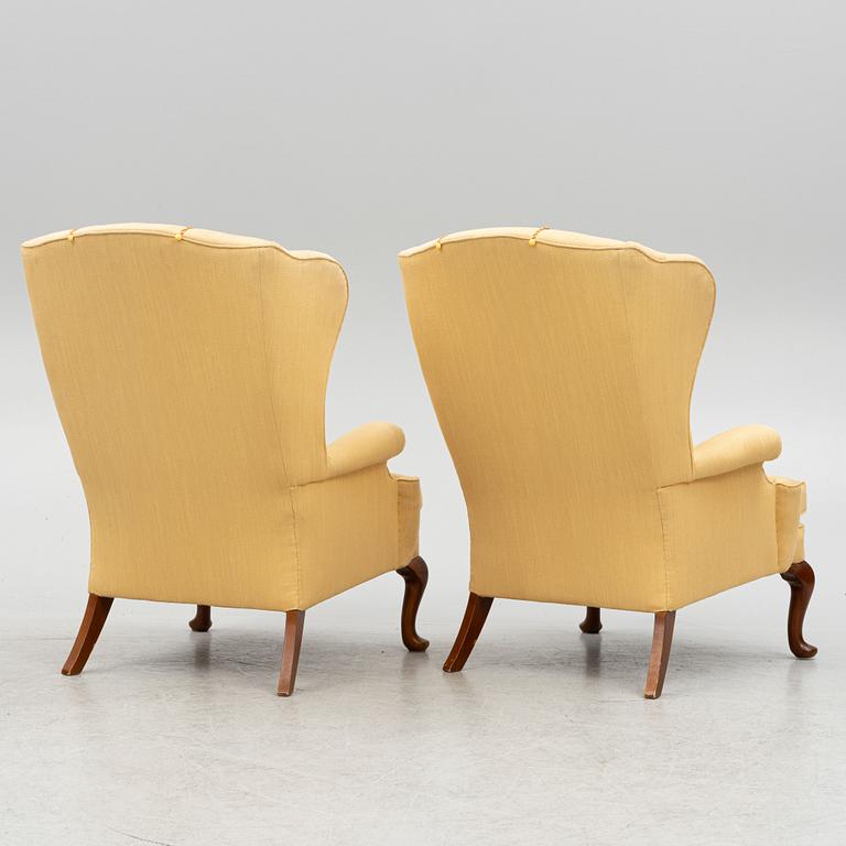 A pair of wingback armchairs, second half of the 20th century.