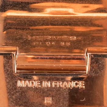 A Hermès "Clic-H" bracelet.