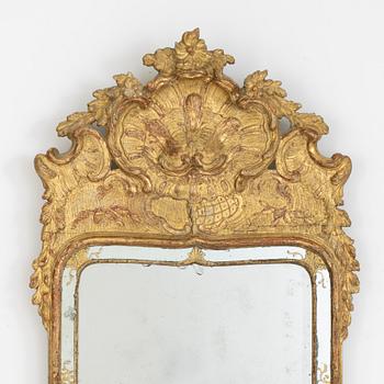 A rococo mirror, second part of the 18th Century.