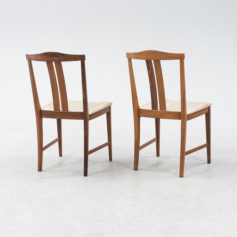 A 1960's/70's rosewood veneered dining group.