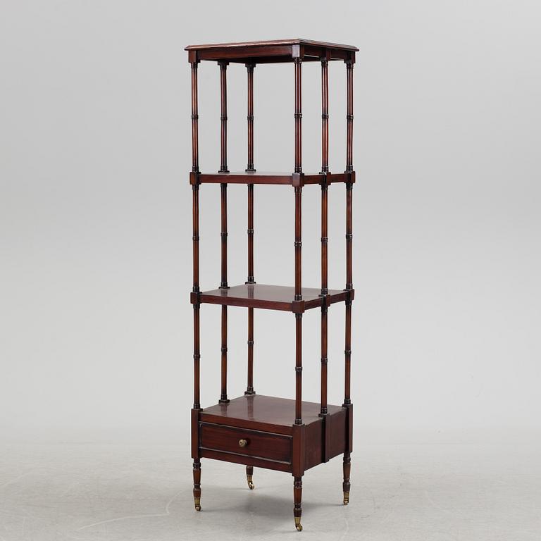 A Mahogany shelf, ca 1900.