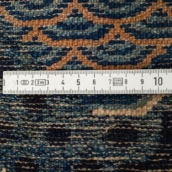 A RUG, semi-antique Baotou, China, ca 165 x 87 cm.