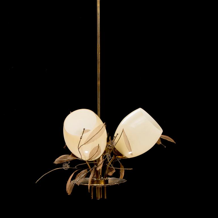 A mid 20th Century model 9029/4 chandelier for Taito Oy, Finland.