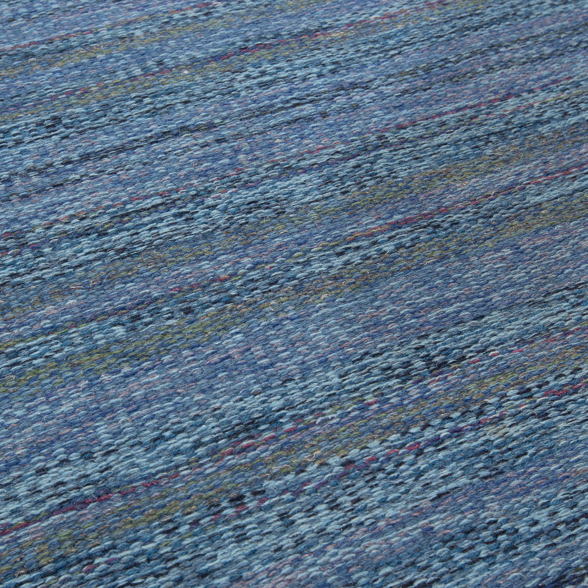 A CARPET, flat weave, atributed to Rakel Carlander, around 306 x 197 cm.