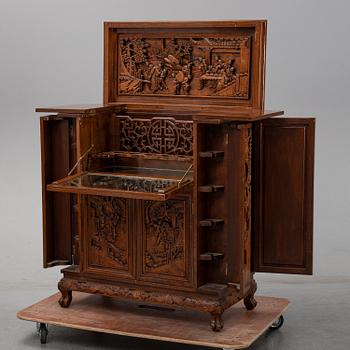 A 20th century chinese bar cabinet.