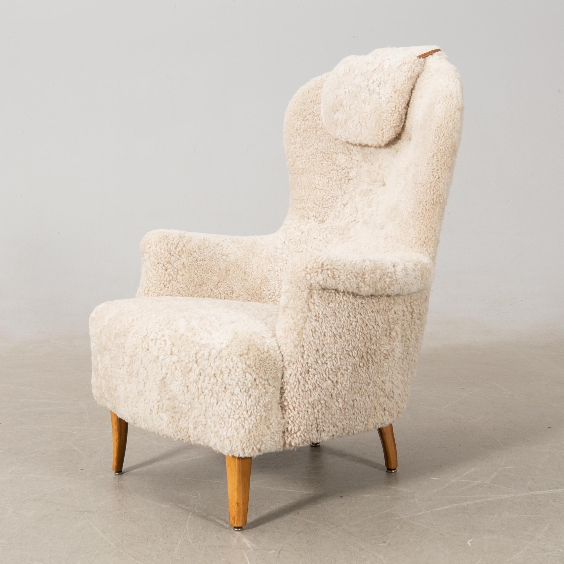 Carl Malmsten, armchair "Farmor", second half of the 20th century.