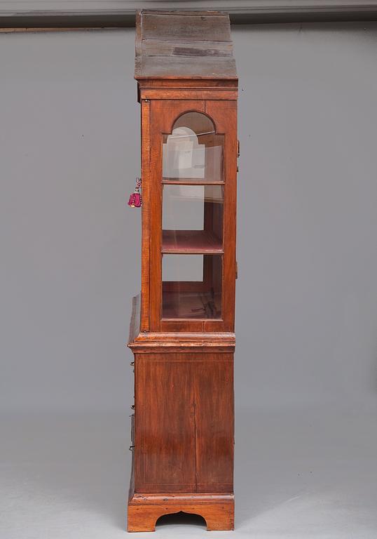 A VITRIN CABINET.