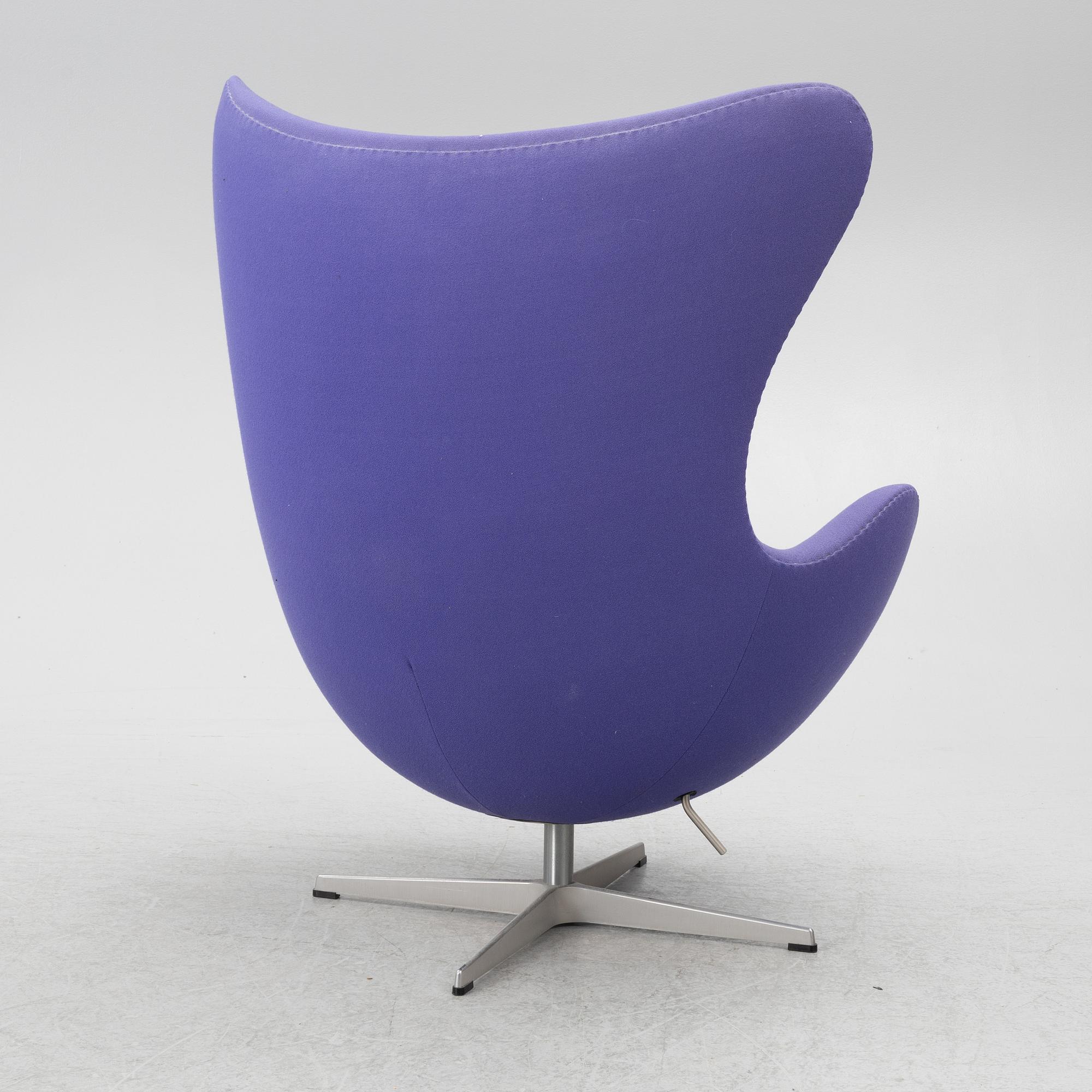 Arne Jacobsen, an armchair with footstool, "The Egg", Fritz Hansen, Denmark, 2003.