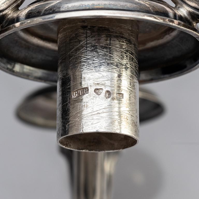 A pair of Swedish 19th century silver candelabra, marks of Gustaf Theodor Folcker, Stockholm 1871.