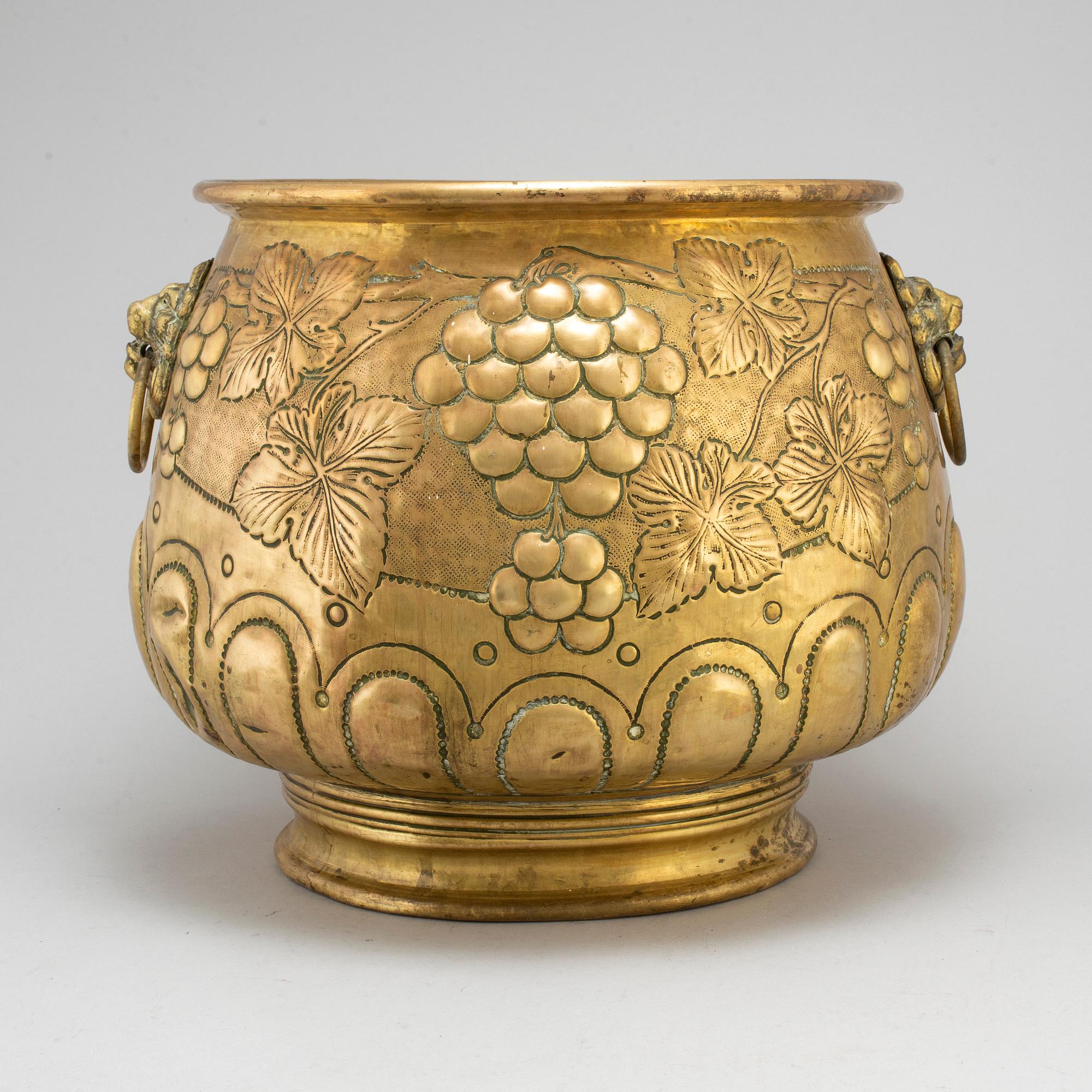 A 19th century large brass flower pot.